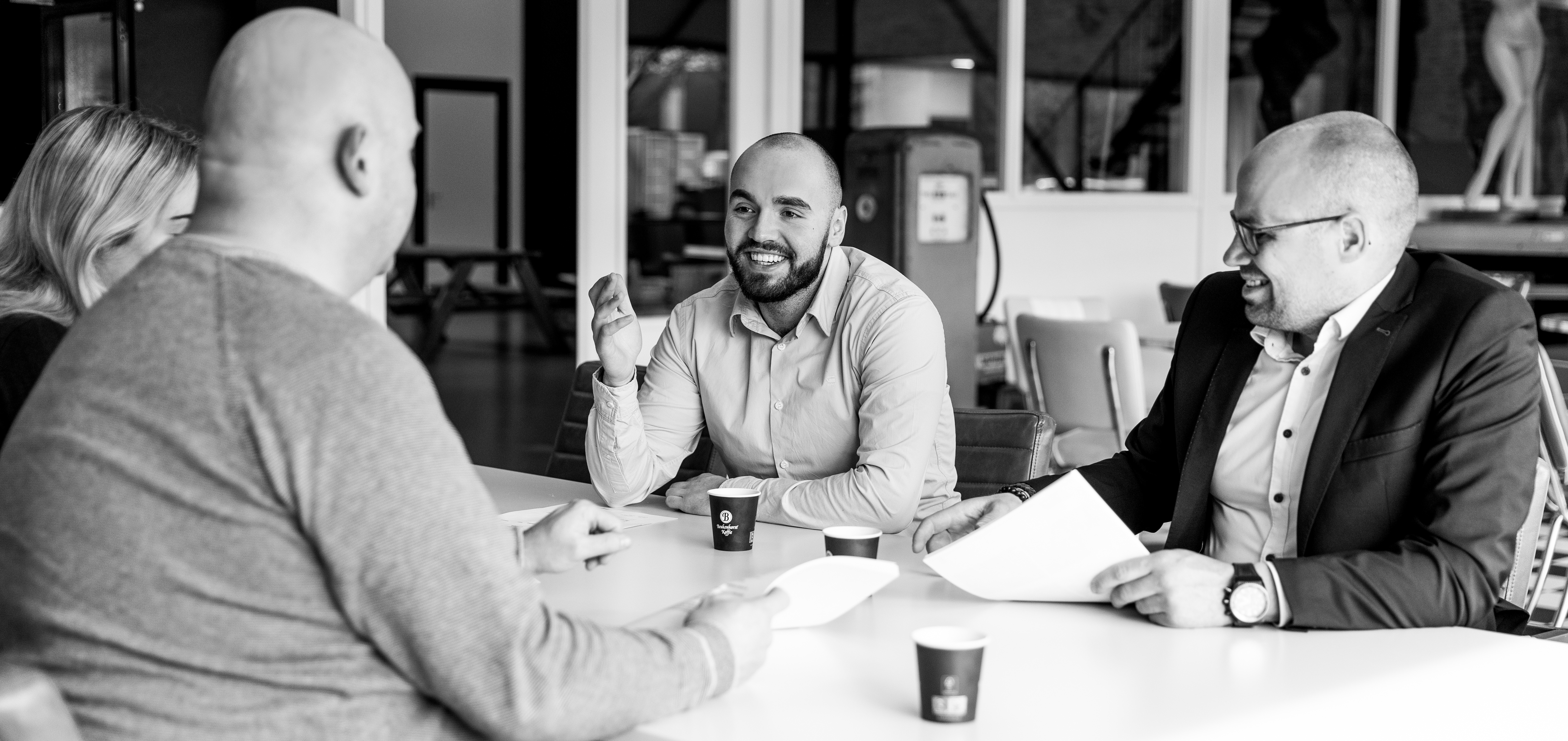 Team foto overleg kantoor